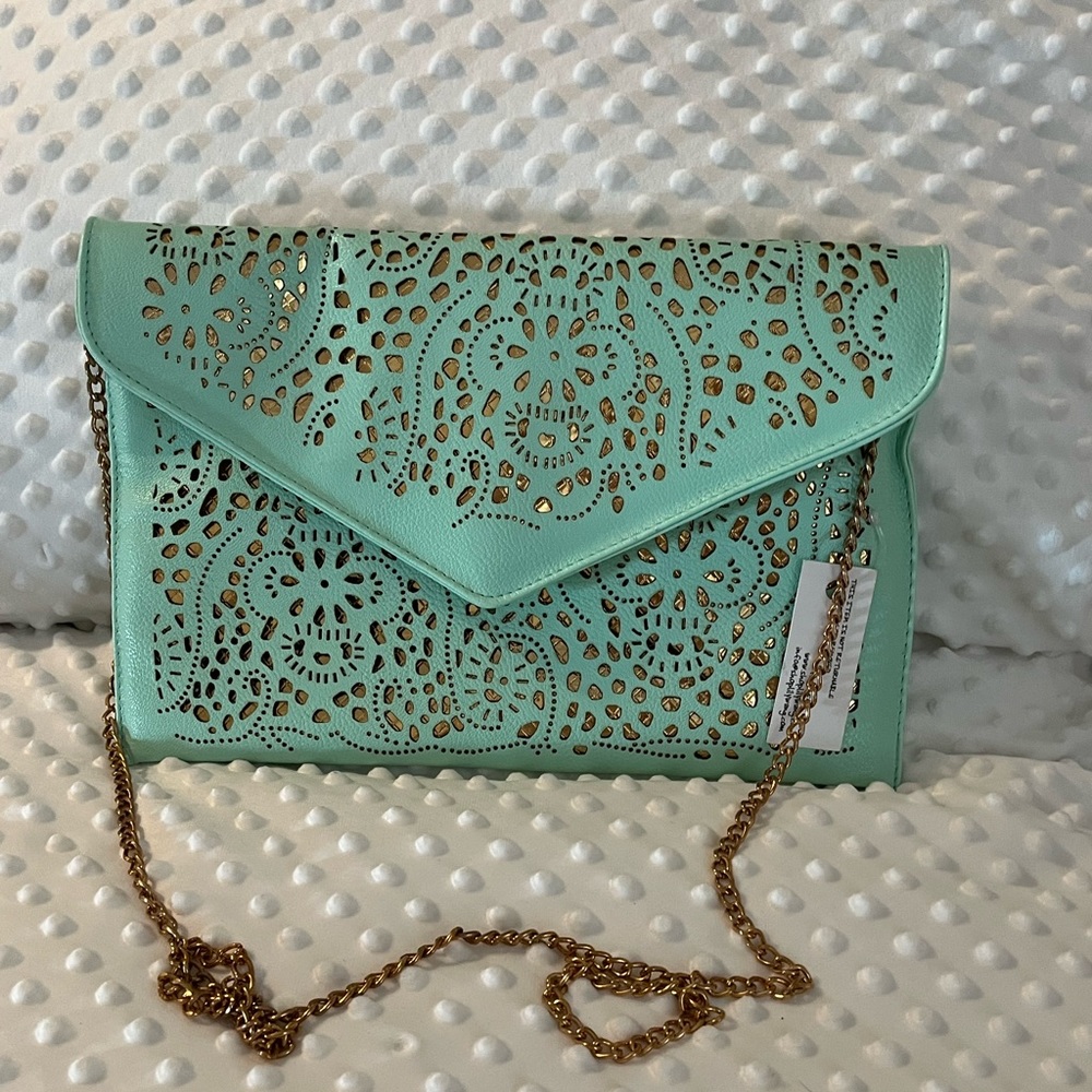 Laser cut envelope style clutch